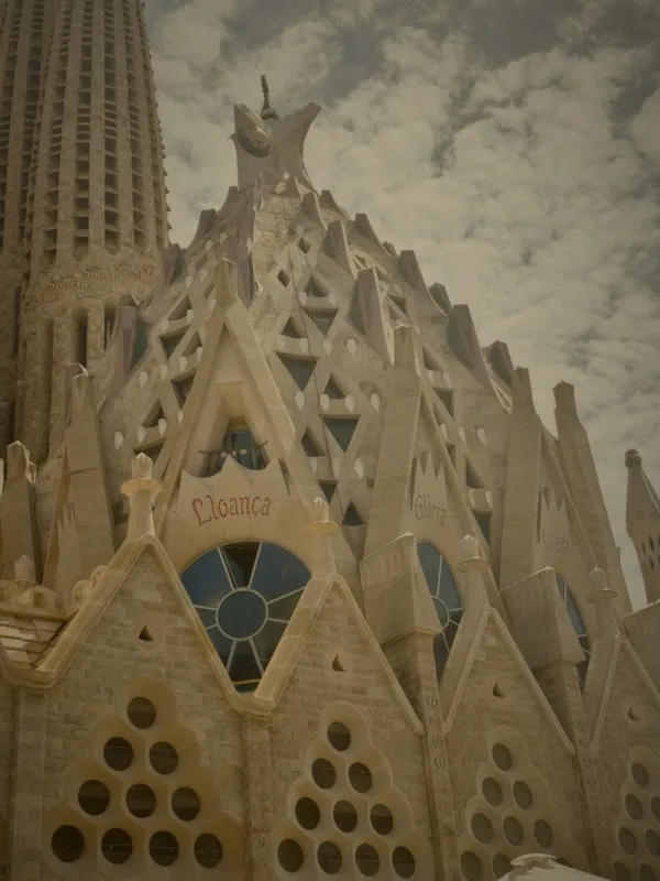 Sagrada Familia detail with stained glass and ornate stonework